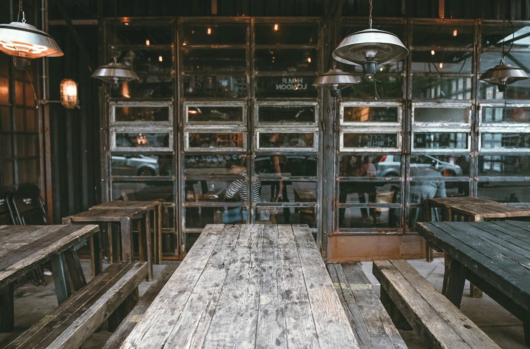 Sunlit restaurant dining room prepared for service